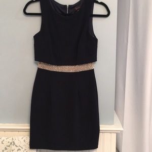 Navy mini dress with beaded detail